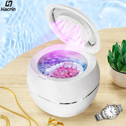 Nettoyeur à ultrasons Sonidento avec bijoux et montre dans la cuve